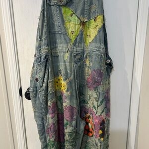 Magnolia Pearl Distressed Denim Jumpsuit with Butterfly and Floral Design